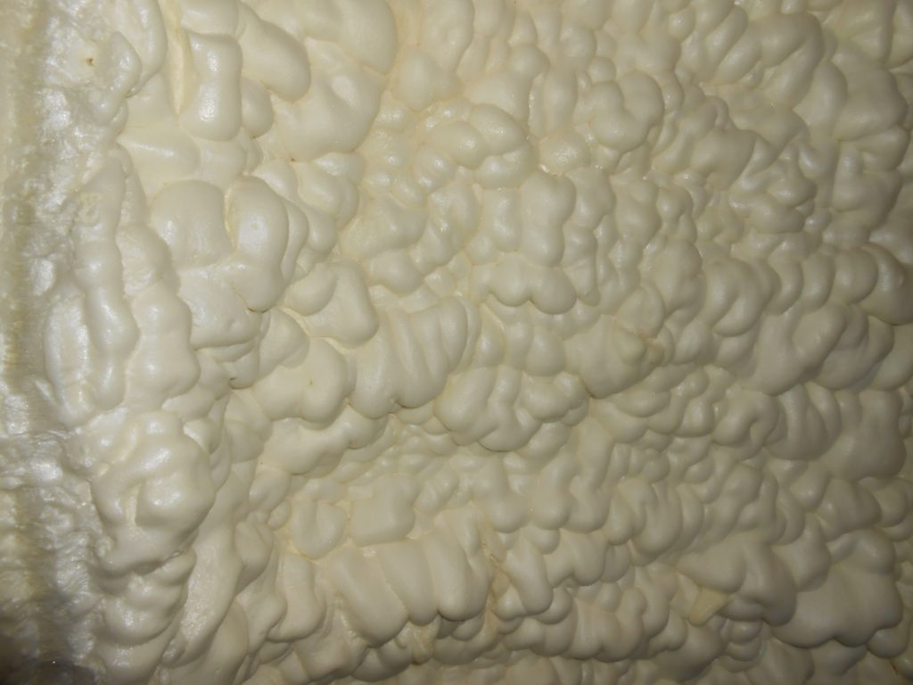 picture of expanded spray foam insulation viewed during a home inspection