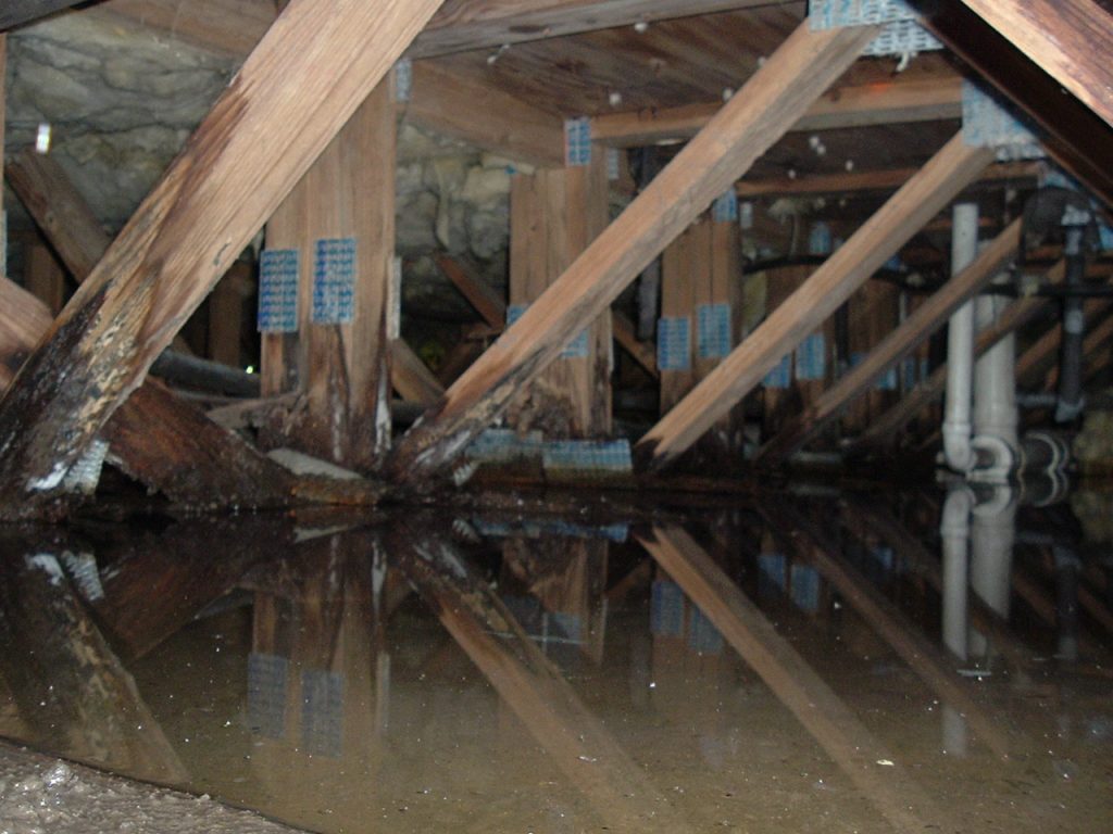 flooded crawlspace viewed during a home inspection